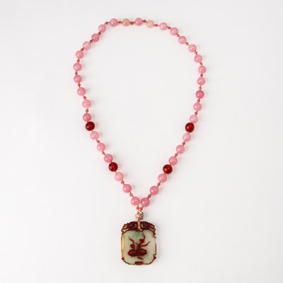 Lot 381 - A Chinese Red and Green Overlay Glass Pendant