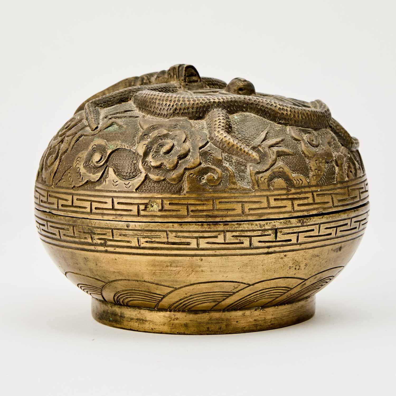 Lot 65 - A Chinese Bronze 'Dragon' Circular Domed Box