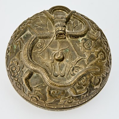 Lot 65 - A Chinese Bronze 'Dragon' Circular Domed Box