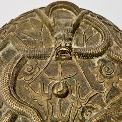 Lot 65 - A Chinese Bronze 'Dragon' Circular Domed Box
