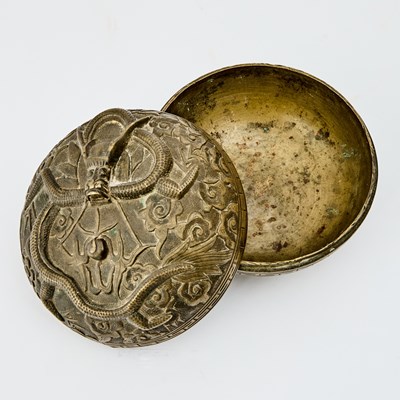 Lot 65 - A Chinese Bronze 'Dragon' Circular Domed Box