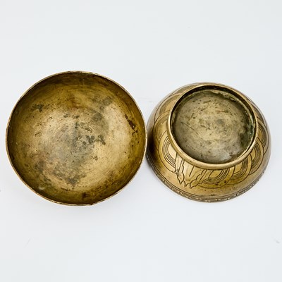 Lot 65 - A Chinese Bronze 'Dragon' Circular Domed Box