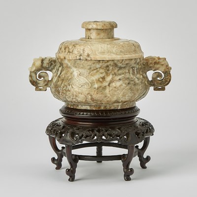 Lot 36 - A Chinese Mottled Jade Archaistic Gui-Form Censer and Cover