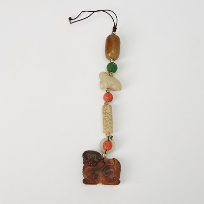 Lot 42 - A Chinese String of Jade and Coral Pendants