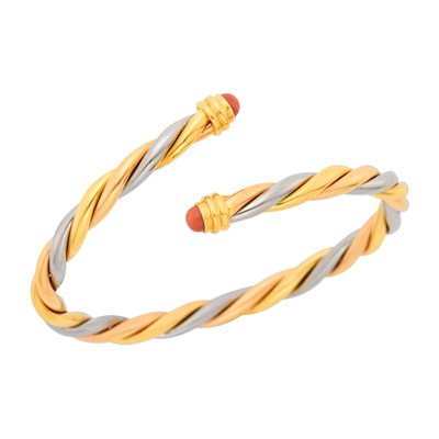 Lot 153 - Cartier Tricolor Gold and Coral Crossover Twisted Bangle Bracelet, France