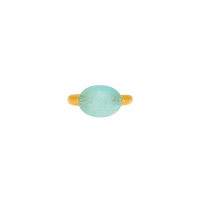 Lot 1005 - Gold and Tumbled Aquamarine Bead Ring