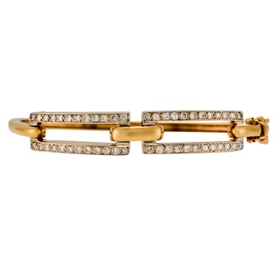 Lot 1025 - Two-Color Gold and Diamond Bangle Bracelet