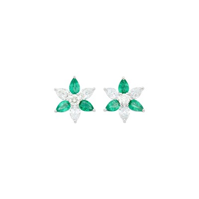 Lot 69 - Pair of Platinum, White Gold, Emerald and Diamond Flower Earrings