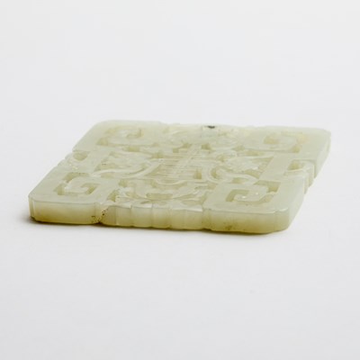 Lot 39 - A Chinese Pale Celadon Jade Openwork Plaque