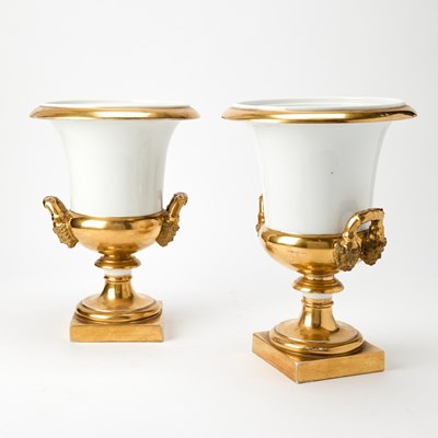 Lot 211 - Pair of Continental Gilt Decorated Porcelain Two-Handled Footed Urns