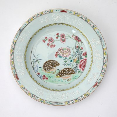 Lot 84 - A Chinese Export Slip-Decorated Enameled Porcelain Dish