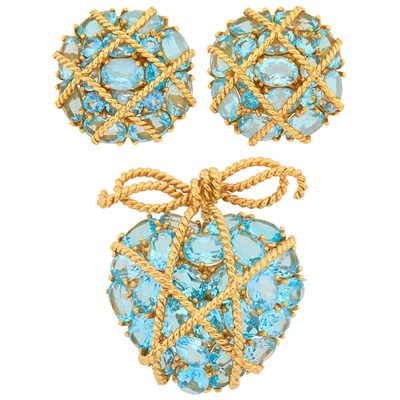 Lot 129 - Pair of Gold and Blue Topaz Wrapped Button Earclips and Heart Pendant-Brooch