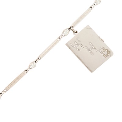 Lot 1076 - Platinum and Diamond Charm Bracelet