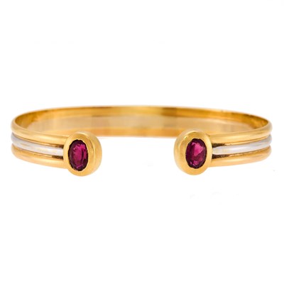 Lot 1003 - Two-Color Gold and Rubellite Bangle Bracelet