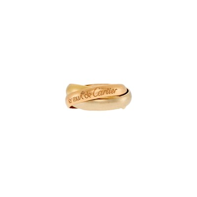 Lot 1003 - Cartier Tricolor Gold 'Les Must de Cartier Trinity' Band Ring, France