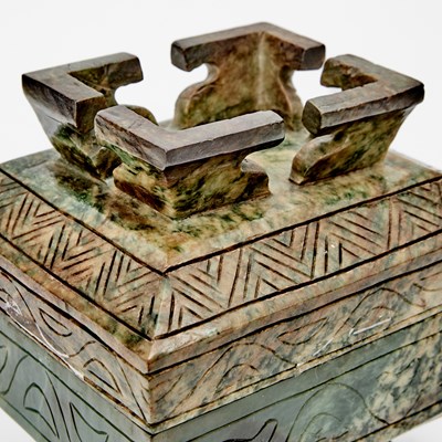 Lot 43 - A Chinese Mottled Jade Archaistic Vessel, Fu