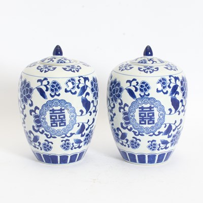 Lot 133 - Pair of Chinese Style Blue and White Covered Urns