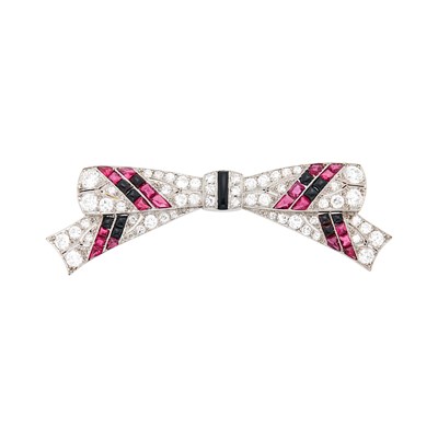 Lot 85 - Tiffany & Co. Platinum, Diamond, Cabochon Ruby and Black Onyx Bow Pin