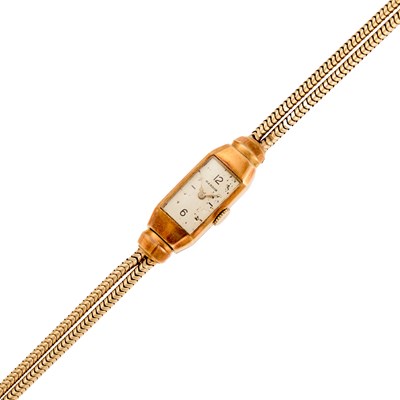 Lot 1035 - Ulysse Nardin Lady's Gold Wristwatch