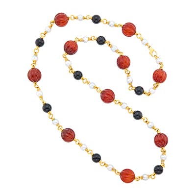 Lot 128 - Long Gold, Fluted Carnelian Bead, Black Onyx Bead and Semi-Baroque Cultured Pearl Chain Necklace