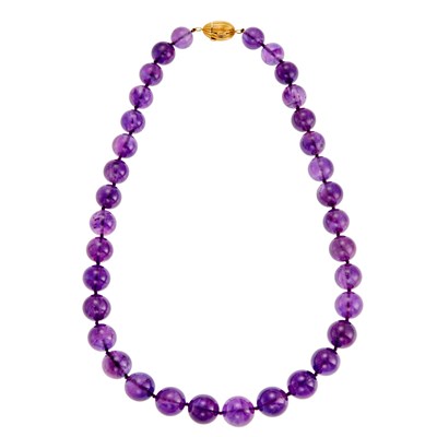 Lot 1059 - Amethyst Bead Necklace with Gold Clasp