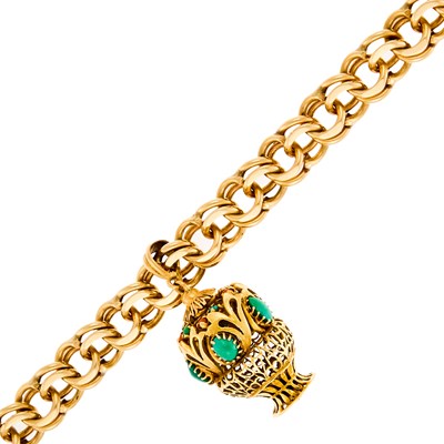 Lot 1072 - Gold and Cabochon Turquoise and Carnelian Charm Bracelet