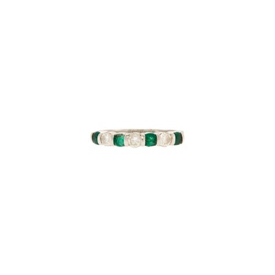 Lot 1173 - Tiffany & Co. Platinum, Emerald and Diamond Band Ring
