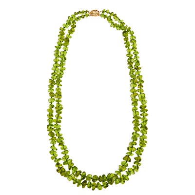Lot 1017 - Gump's Double Strand Tumbled Peridot Bead Necklace with Gold Clasp