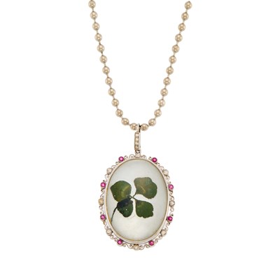 Lot 1080 - Platinum, Painted Rock Crystal and Mother-of-Pearl Four Leaf Clover, Ruby and Diamond Pendant with Metal Chain Necklace