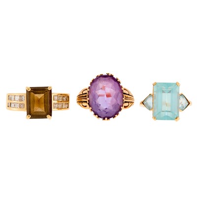 Lot 1214 - Three Gold, Amethyst, Aquamarine, Smoky Quartz and Diamond Rings