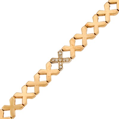 Lot 1036 - Two-Color Gold and Diamond 'X' Bracelet