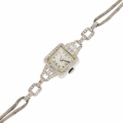 Lot 1080 - Croton Lady's Platinum, Steel and Diamond Wristwatch