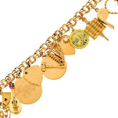 Lot 1110 - Gold, Low Karat Gold, Black Star Sapphire, Enamel and Gem-Set Charm Bracelet
