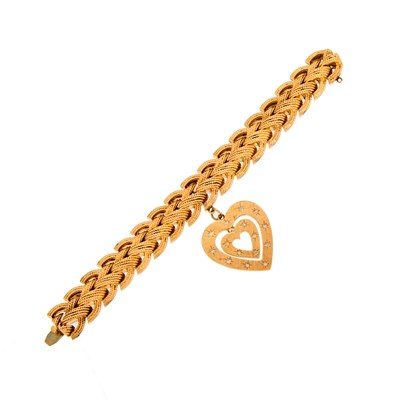 Lot 1032 - Gold and Diamond Heart Charm Bracelet