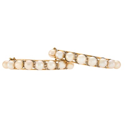 Lot 1021 - Pair of Two-Color Gold, Cultured Pearl and Diamond Bangle Bracelets