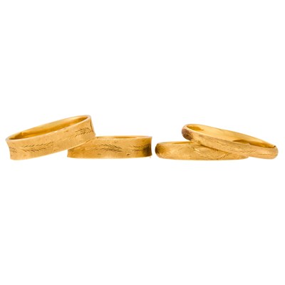 Lot 1056 - Four Gold Bangle Bracelets