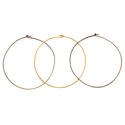 Lot 1244 - Three Gold and Silver Torque Necklaces