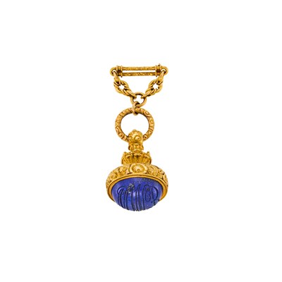 Lot 1099 - Gold and Carved Lapis Lapel-Brooch