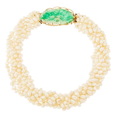 Lot 1213 - Multistrand Semi-Baroque Freshwater Pearl Necklace with Gold and Carved Dyed Jadeite Clasp