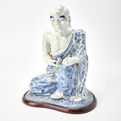 Lot 271 - A Chinese Blue and White Porcelain Figure of a Luohan