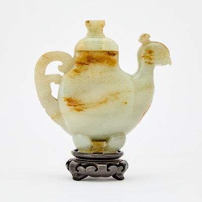 Lot 45 - A Chinese Celadon Jade ‘Phoenix-Form' Vase and Cover