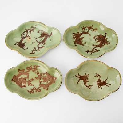 Lot 165 - A Set of Four Chinese Celadon Glazed Ceramic Dishes