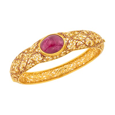 Lot 36 - Gold, Cabochon Ruby, Diamond and Orange Enamel Bangle Bracelet