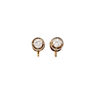 Lot 1128 - Platinum, Rose Gold and Diamond Earrings