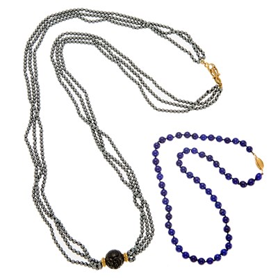 Lot 1146 - Long Triple Strand Hematite Bead, Metal and Carved Black Onyx Necklace and Lapis Bead Necklace with Gold Clasp