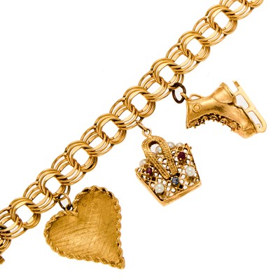 Lot 1227 - Gold and Gem-Set Charm Bracelet