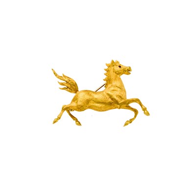 Lot 1231 - Gold and Ruby Horse Brooch