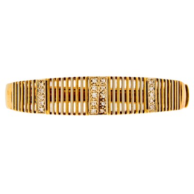 Lot 1243 - Two-Color Gold and Diamond Bangle Bracelet