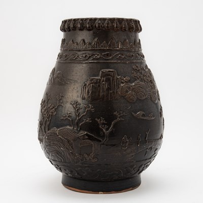 Lot 407 - A Chinese Black Glazed Pottery Jar