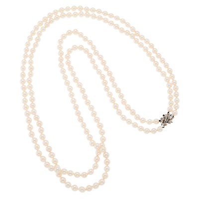 Lot 1113 - Long Double Strand Cultured Pearl Necklace with White Gold and Diamond Clasp